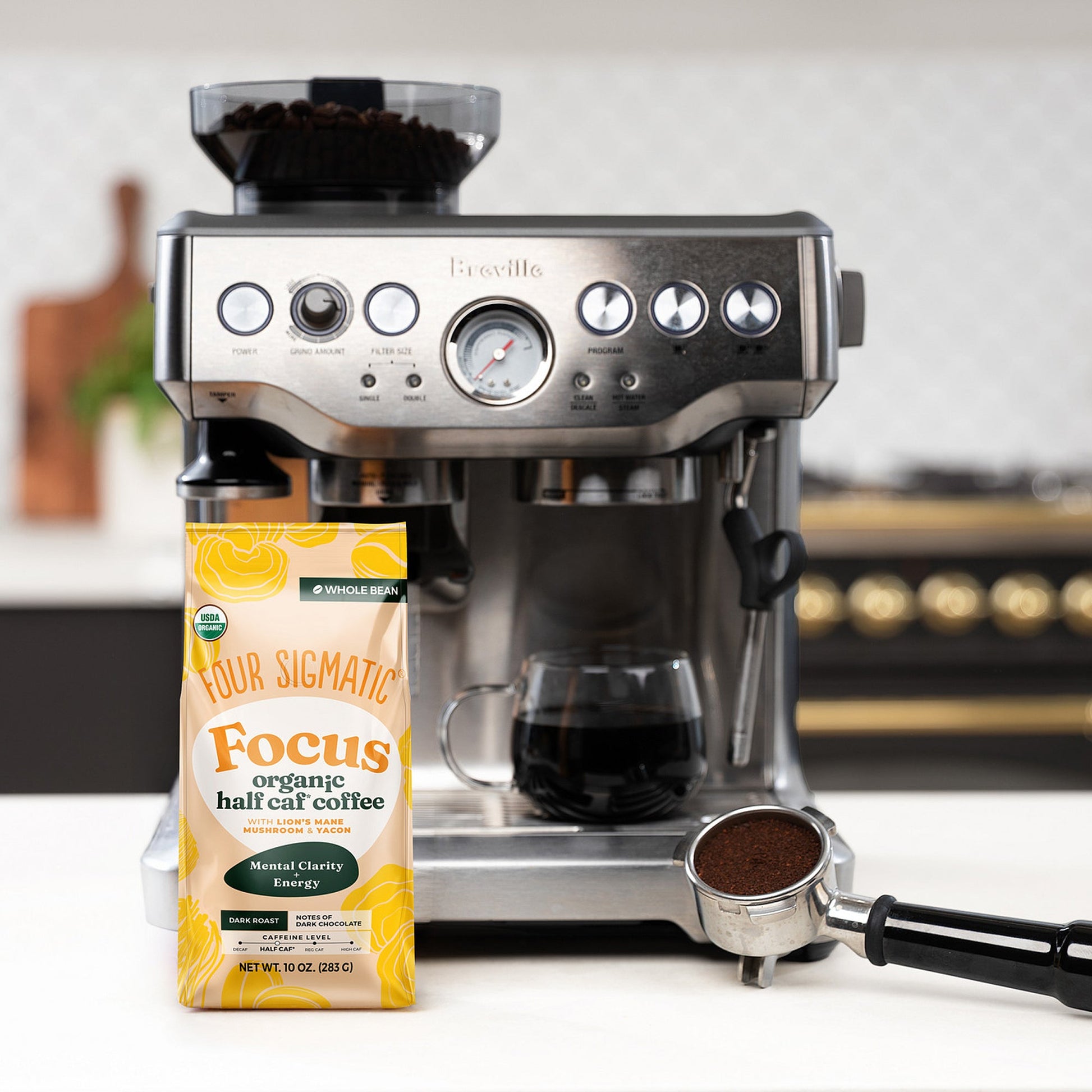 focus-half-caf-whole-bean-coffee-m0 Focus_Org_Dark_Roast_High_Caf_Kitchen_Pour_Woman_4_47b71a0c-c7fc-40fd-a2bc-fa7389dfb410.jpg